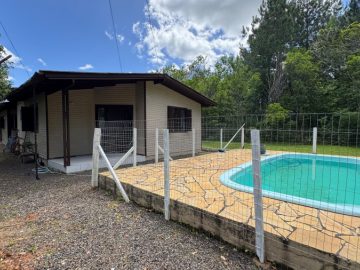 Fortes Im�veis Vende Casa no Centro de Maquin� - RS