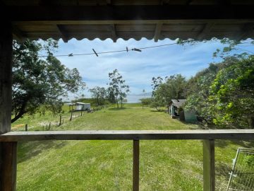 Fortes Im�veis Vende - Casa com acesso a lagoa dos Barros